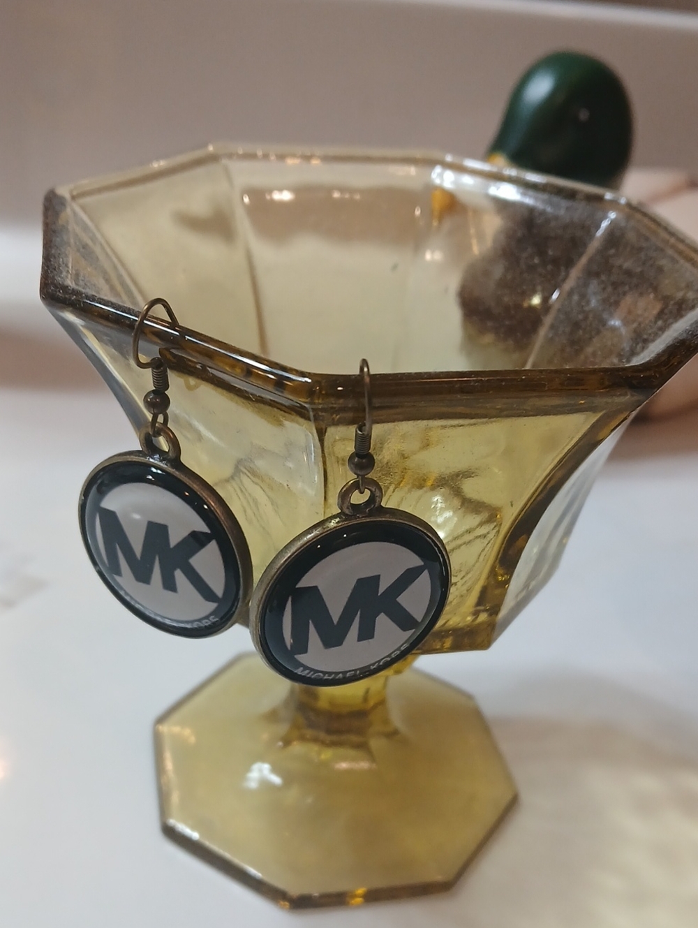 Michael Kors round logo dangle earrings feature the brand's iconic "MK" monogram - Picture 8 of 8